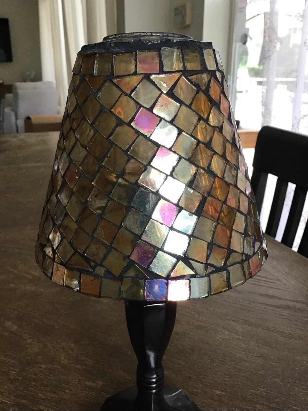 Mosaic tealight candle lamp featuring a stained glass shade.